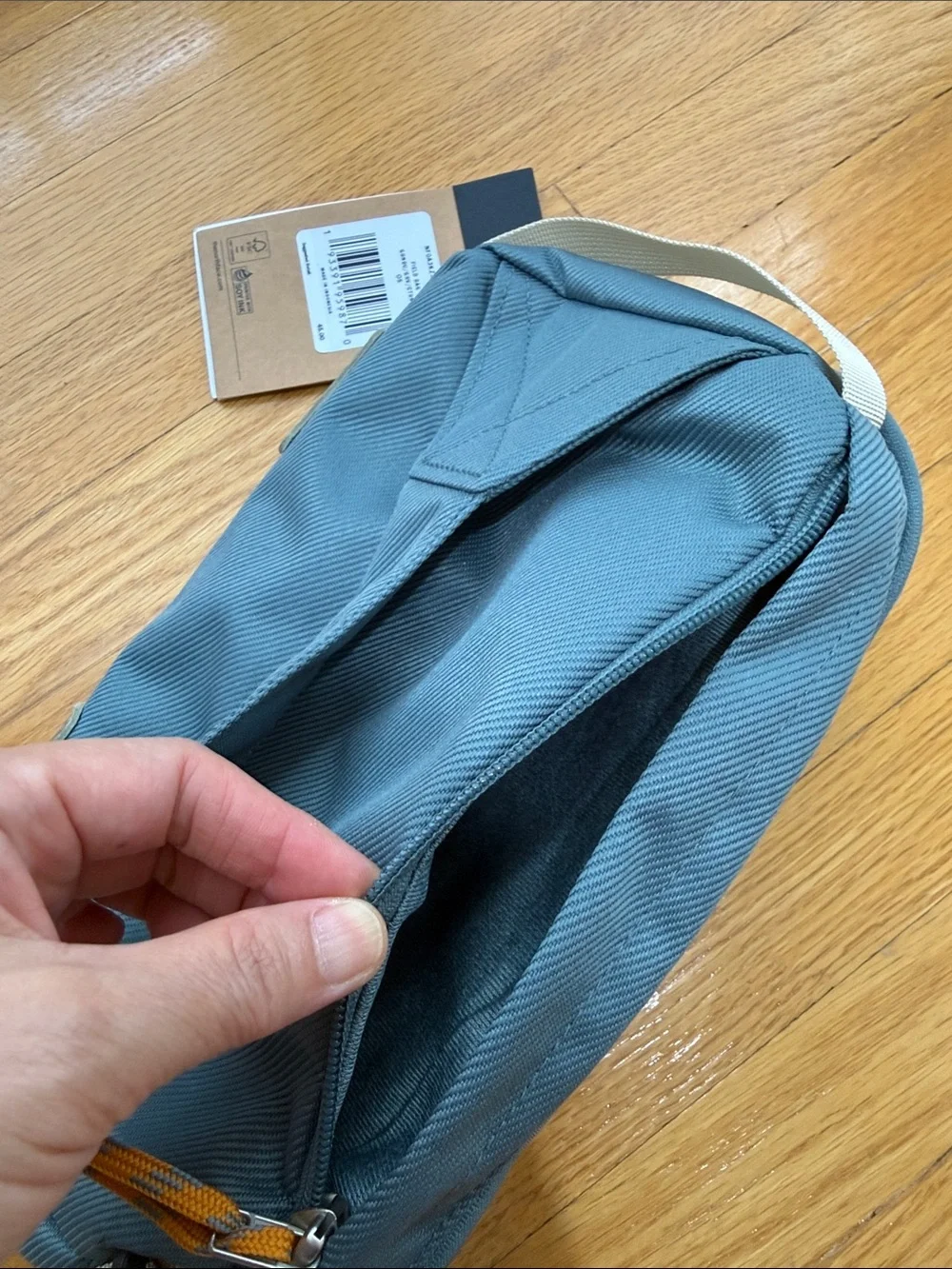 The North Face Teal Sling Bag with Cream Strap New with Tags